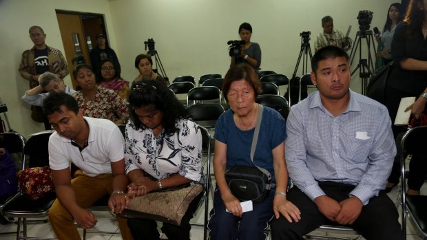 From left: Myuran Sukumaran's brother, Chinthu, mother Raji, Andrew Chan's mother, Helen, and brother Michael.