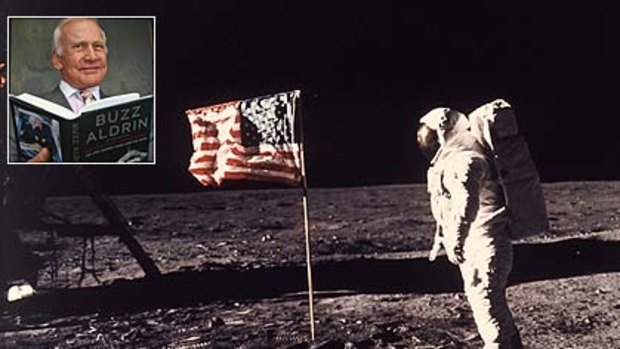 One giant step ... Edwin "Buzz''  Aldrin becomes the second man  to walk on the moon. Inset:  Aldrin promoting his book.