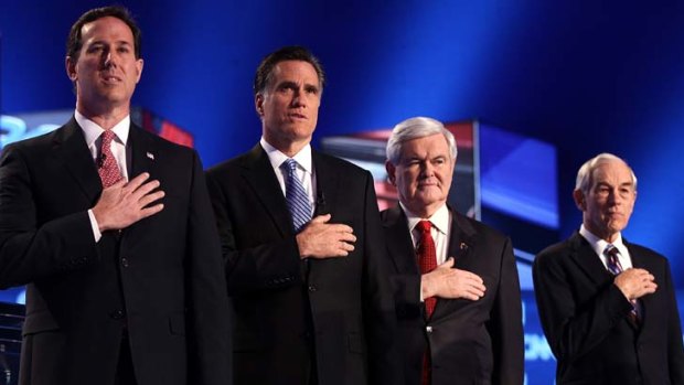 Race is heating up ... remaining candidates Rick Santorum, Mitt Romney, Newt Gingrich and Ron Paul at the Republican debate on Thursday night.