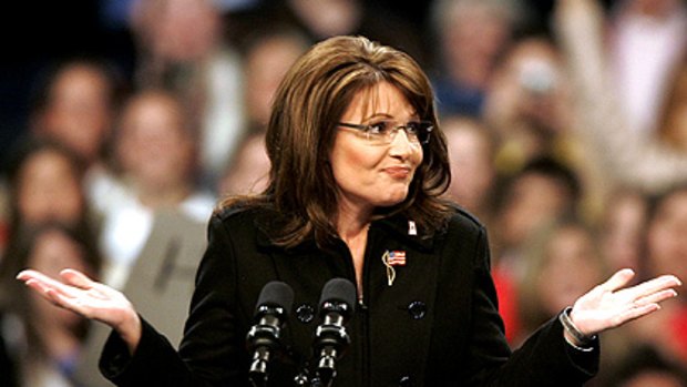 Sarah Palin shrugs during a campaign stop last year.