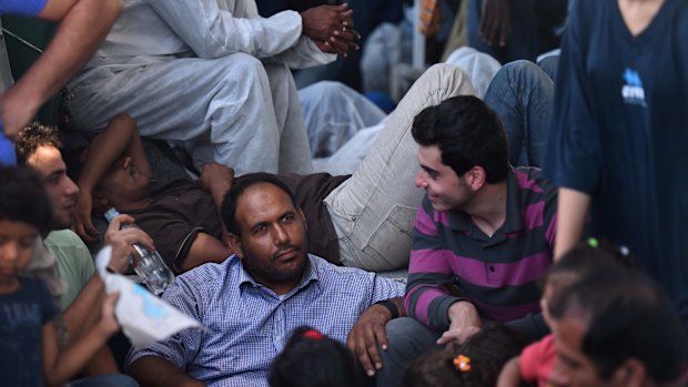 Mohamed, 33, a driver from Syria, on the deck of the MY Phoenix. 