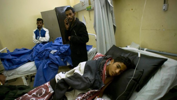 Abdallah Abdel Nasser, 14, receives medical treatment at Suez Canal University hospital in Ismailia, Egypt, Friday, Nov. 24, 2017, after he was in injured during an attack on a mosque. Militants attacked a crowded mosque during Friday prayers in the Sinai Peninsula, setting off explosives, spraying worshippers with gunfire and killing more than 200 people in the deadliest ever attack by Islamic extremists in Egypt. (AP Photo/Amr Nabil)