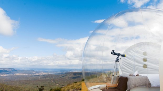 Three bubble tents are dreamily positioned overlooking Capertee Valley.