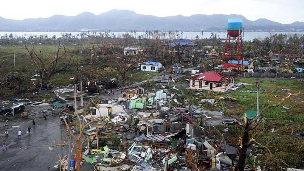 Devastation: Houses destroyed by the strong winds caused by typhoon Haiyan at Tacloban.