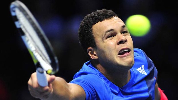 Jo-Wilfried Tsonga in action against Rafael Nadal on day five of the ATP World Tour Finals tennis tournament in London.
