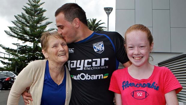 Family affair ... Canterbury's Josh Reynolds appreciated the support of his grandmother, Robyn Snashall, and 12-year-old cousin Madisen at Belmore yesterday.