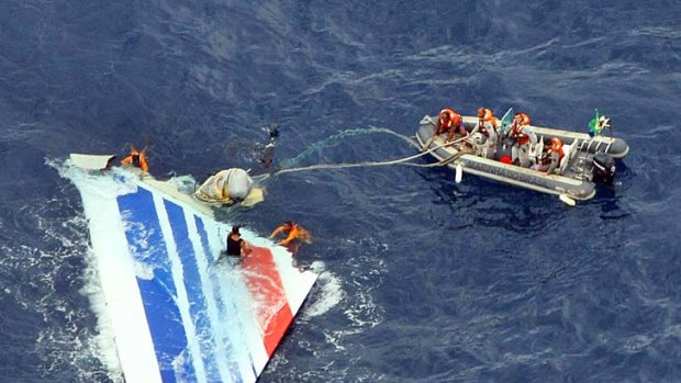 Divers recover part of the tail of the Air France jet in the Atlantic. A new search may locate the plane's black boxes.