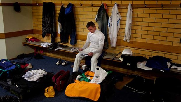 At the office ... veteran rider Darren Gauci casts a lonely figure in the jockeys' room at Ballarat, where the races were called off this week due to inclement weather.