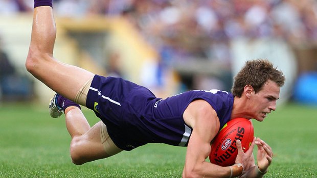 Freo's Jayden Pitt has had to put his AFL career on hold because of a heart issue.