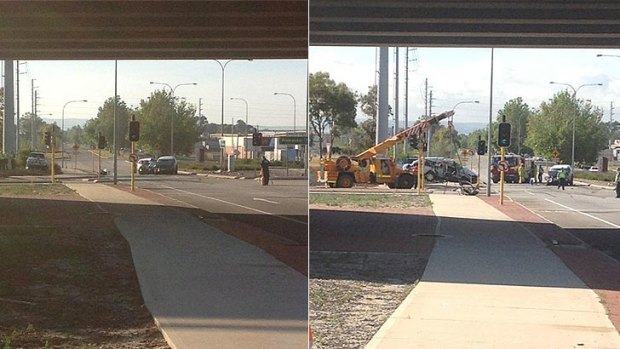 The crash scene earlier this morning (left) and a crane called in to clear the wreckage (right).