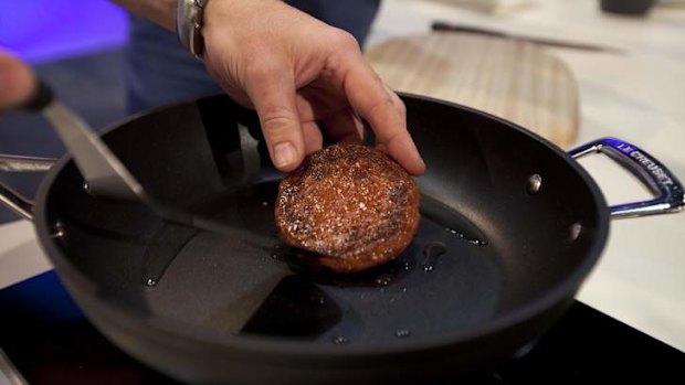 The test tube burger is prepared for a first public tasting.