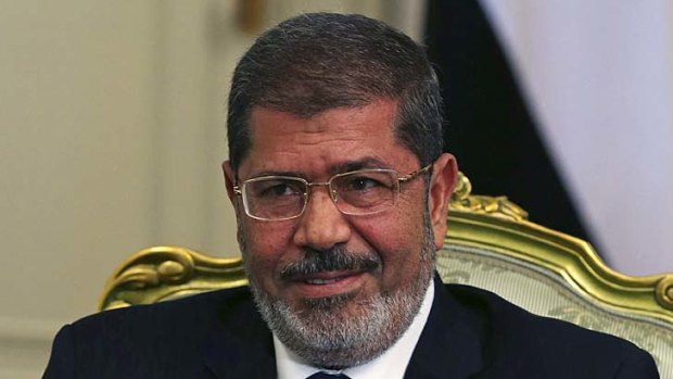 Shaken ...Egypt's President Mohamed Mursi and his government following the Sinai attack.