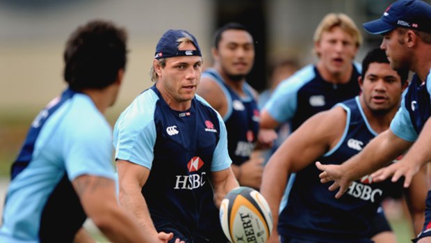 Trial by fire ... Waratahs captain Phil Waugh leads his troops in training at Viking Park yesterday in preparation for their final trial against arch-rivals the Brumbies.