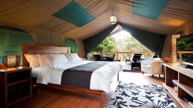 Spacious and audacious ... Tandara's African safari-style tent offers a huge double bed and deluxe bathroom.