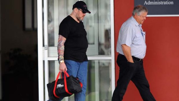 Paul Leslie Aiton (left) walks out of the Marngoneet Correction Centre in Lara.