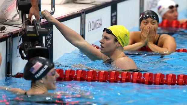 Mixed emotions ... Australia's Emily Seebohm (yellow cap) is shattered after being touched out in the women's 100m backstroke as gold medallist Missy Franklin (USA, below left) and bronze medallist Aya Terakawa (Japan, second from top) celebrate.