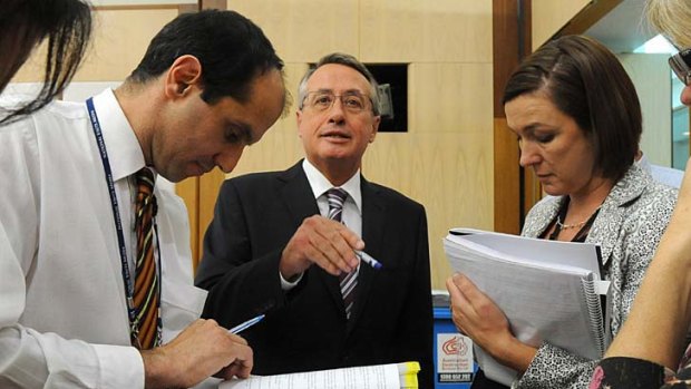 Wayne Swan briefs journalists during the 2010 budget lock-up.