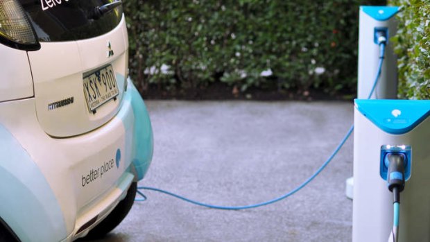 An electric car at a recharging station.