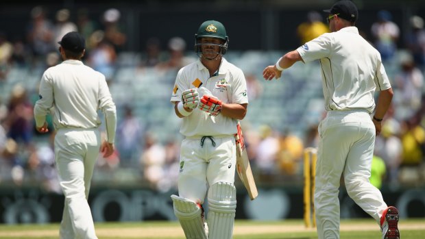 All over: David Warner's innings finally comes to an end early on day two.