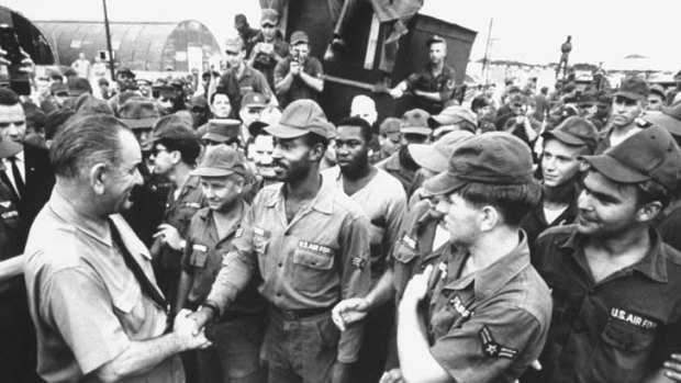 President Lyndon Johnson greets troops at Cam Ranh Bay in 1966.