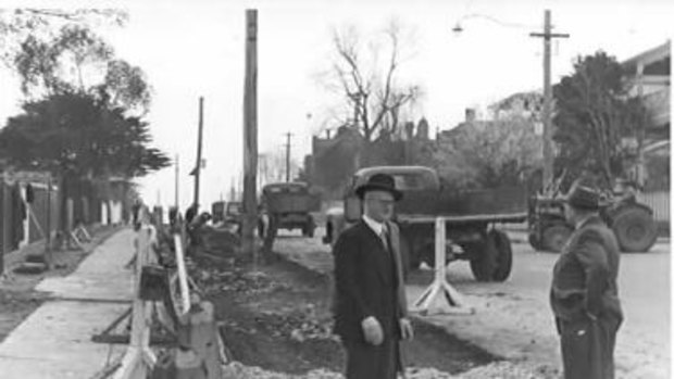 Punt Road being widened after the 1954 option to acquire homes was put in place. 