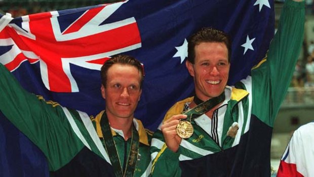 Precious mettle ... silver medallist Daniel Kowalski - now general manager of the Australian Swimmers' Association - and winner Kieren Perkins after the 1500m freestyle at Atlanta, 1996.