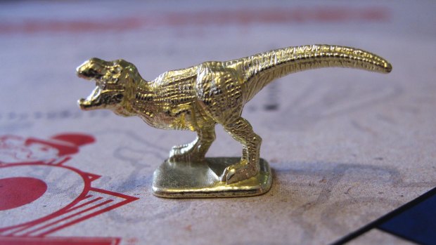 The T-Rex dinosaur is one of three new tokens that will be included in upcoming versions of the board game Monopoly. The boot, wheelbarrow and thimble tokens got the boot. 