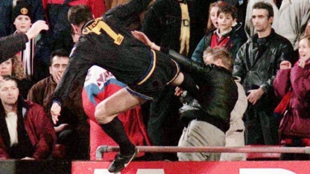 Moment of madness: Eric Cantona takes on a Crystal Palace fan. Great player. No role model.