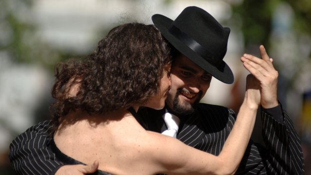 Tango dancers perform in commemoration of Tango Day in downtown Montevideo, 