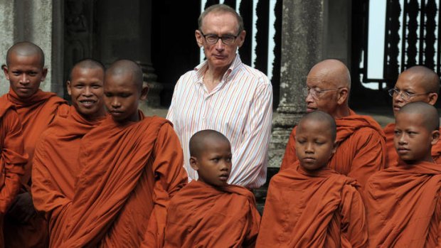 Bob Carr with Buddhist monks during a visit to Cambodia in March.