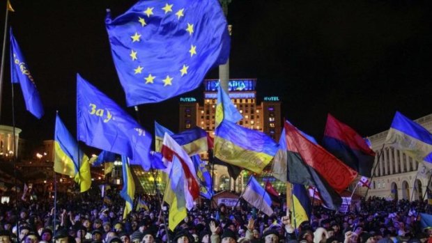 People supporting EU integration attend a rally in Kiev.