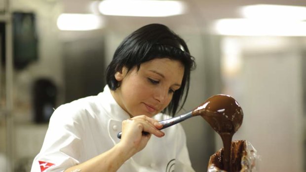 Dani prepares her special brand of chocolate mess.