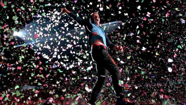 Crowd pleasers ... Coldplay, led by Chris Martin, delivered an incredible spectacle that included confetti, lasers and pyrotechnics to accompany their slick sounds.