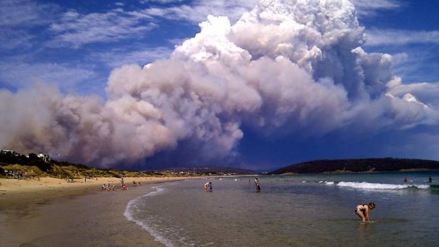 Smoke over the beach at Carlton, about 20 kilometres east of Hobart.