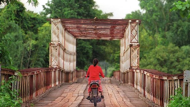 River wild... motorbike is the key transport in Ratanakiri region.