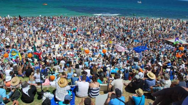 More than 6000 people at Cottesloe voiced their opposition to the state government's shark-kill policy.