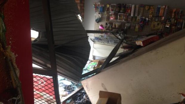 Damage at a convenience store hit by ram-raiders on Thursday morning. Photo: Chris O'Keefe/Nine News, via Twitter.