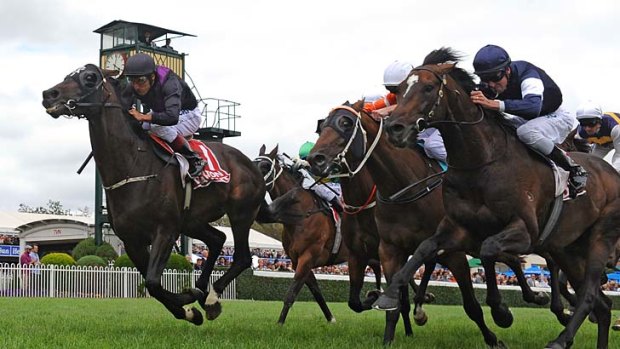 Damien Oliver on Fiorente (left) defeats Steven Arnold riding Mourayan in the Peter Young Stakes.