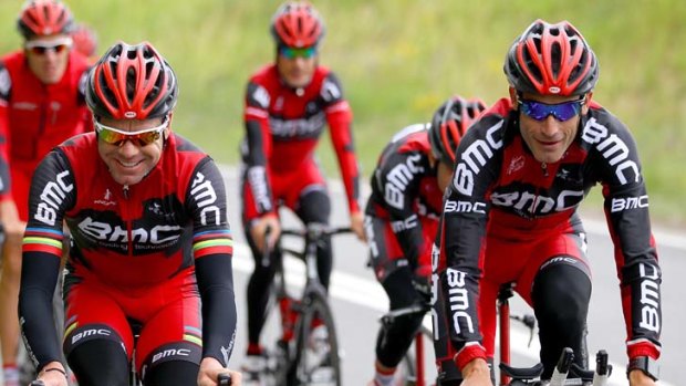 Tour guides &#8230; defending champion Cadel Evans and teammate George Hincapie lead the BMC team during a training ride.