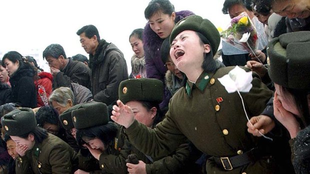 Mourning a leader ... North Koreans cry for Kim Jong-il.