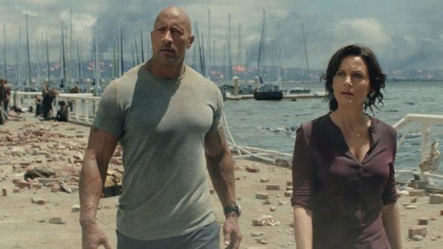 Dwayne Johnson as Ray and Carla Gugino as Emma in a scene from San Andreas.