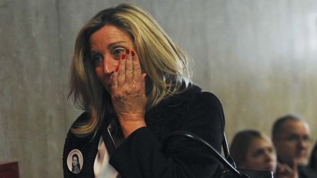 Tears ... a woman reacts after convicted serial killer Rodney Alcala was sentenced to at least 25 years in prison for murdering two New York women in the 1970s.