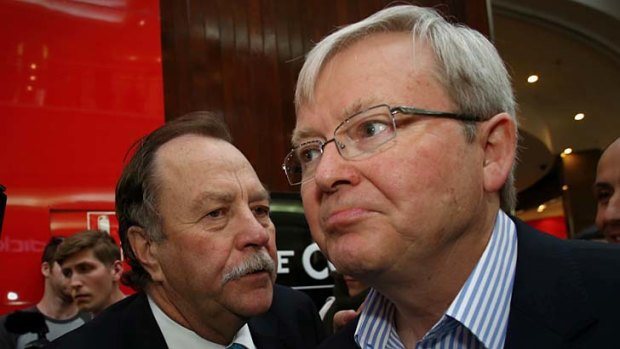 Chaotic style: Former prime minister Kevin Rudd with adviser Bruce Hawker on the campaign trail during the 2013 federal election.