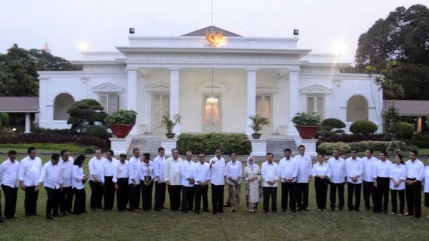 Indonesian President Joko Widodo  presents members of his cabinet at the presidential palace.