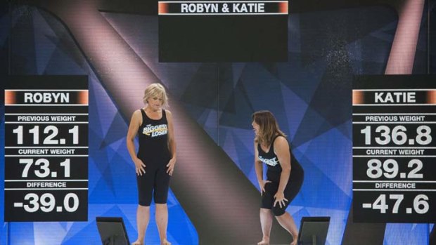 Moment of truth: Tasmanian mother and daughter team, Robyn and Katie Dyke, win the weigh-in showdown.