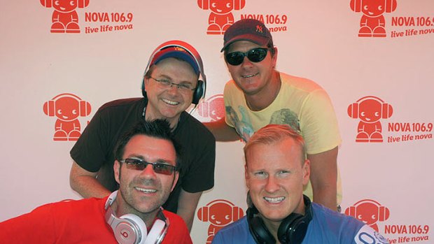 Friendly rivalry ... ABC's Spencer Howson, back left, with the Nova breakfast team, Ash Bradnam, David Lutteral and Kip Wightman.