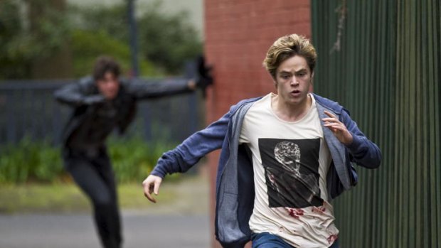 Harrison Gilbertson (right) plays Cal Ormond, a teen on the run, in <i>Conspiracy 365</i>.
