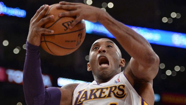 Kobe Bryant grabs a rebound during his comeback for the Los Angeles Lakers during the first half against the Toronto Raptors at Staples Center.