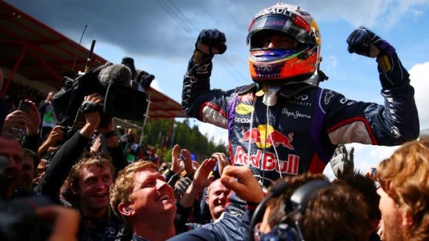 Bully for him: Daniel Ricciardo celebrates after winning the Belgian Grand Prix in August.