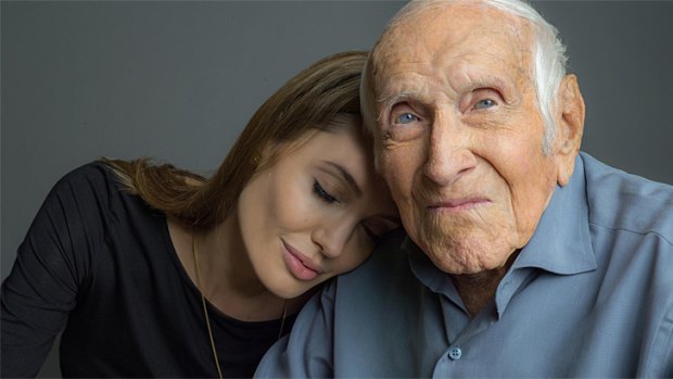 <i>Unbroken</i> director Angelina Jolie and Louie Zamperini, 96, an American hero whose story has taken more than 50 years to be told in film.